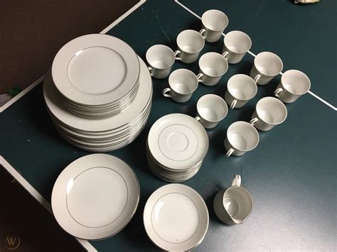 Beautiful Crown Victoria Lovelace Fine China Set including 19 Dinner Plates, 15 Bread Plates, 4 Soup Bowls, 20 Cups, 21 Saucers, 16 Fruit Dishes, 2 Serving Bowls, Salt Pepper Shakers, Creamer and Sugar Bowl. 101 Total.